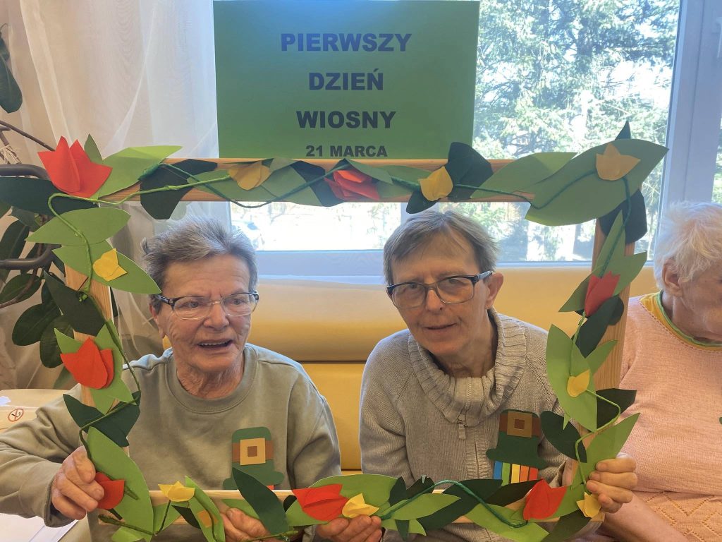 portret 2 podopiecznych w tematycznej ramce